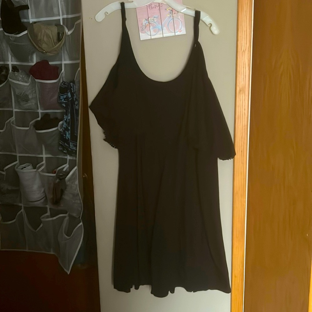 Torrid black midi dress I believe it’s Aline cut super cute details off shoulder